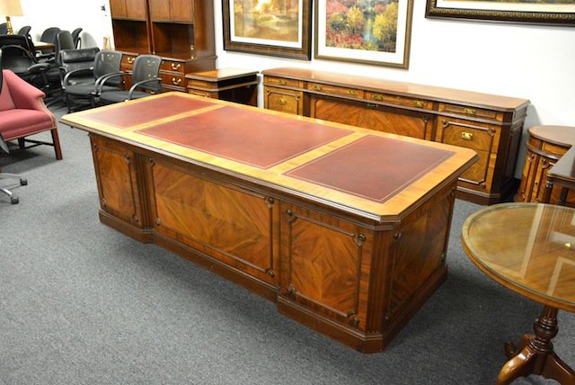 Desk Made of Wood with A Leather Top for An Elevated Look