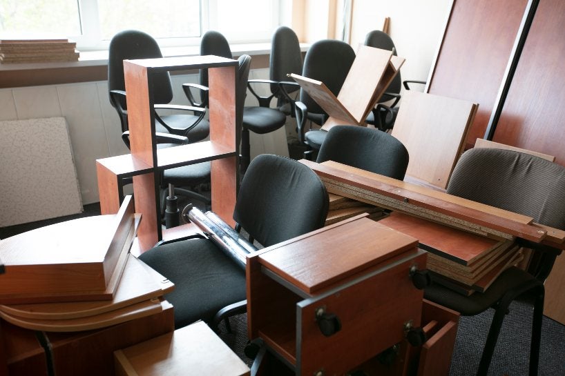 Disassembled used office chair and desk in Houston, TX