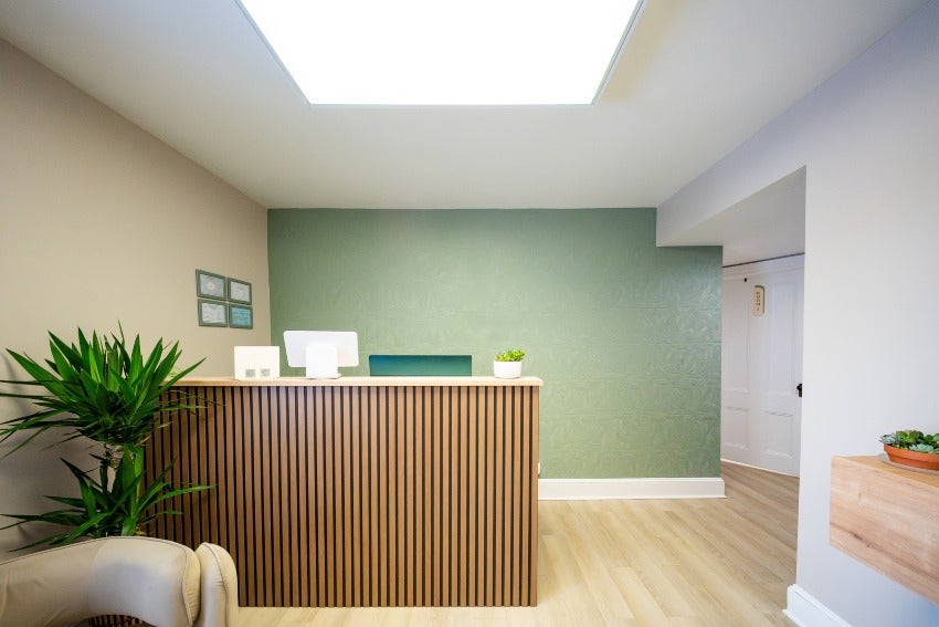 Office reception desk with modern design by Corporate Liquidators in Houston, TX